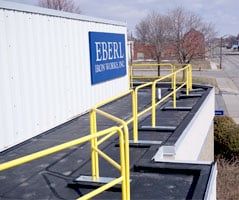 guard rail installed on rooftop edge Eberl Rooftop Support Systems Division
