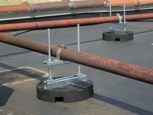 installed puc bases with elevated pipe supports