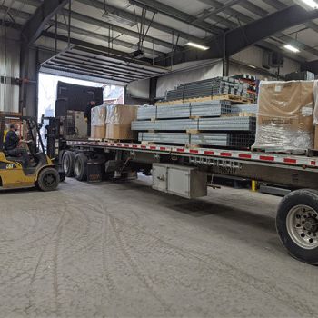 Roof Conduit Supports packaged and loaded on a flatbed truck for rush delivery to Mexico | Roof Pipe Supports | Roof Duct Supports | RTS H-Stands | Rooftop Support Systems | a division of Eberl Iron Works, Inc. | Buffalo, NY USA